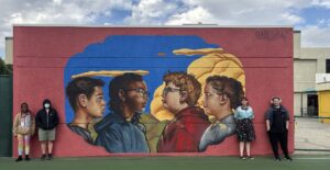 Full Circle: Alumnus Artist Returns to Paint Hope on Campus Walls