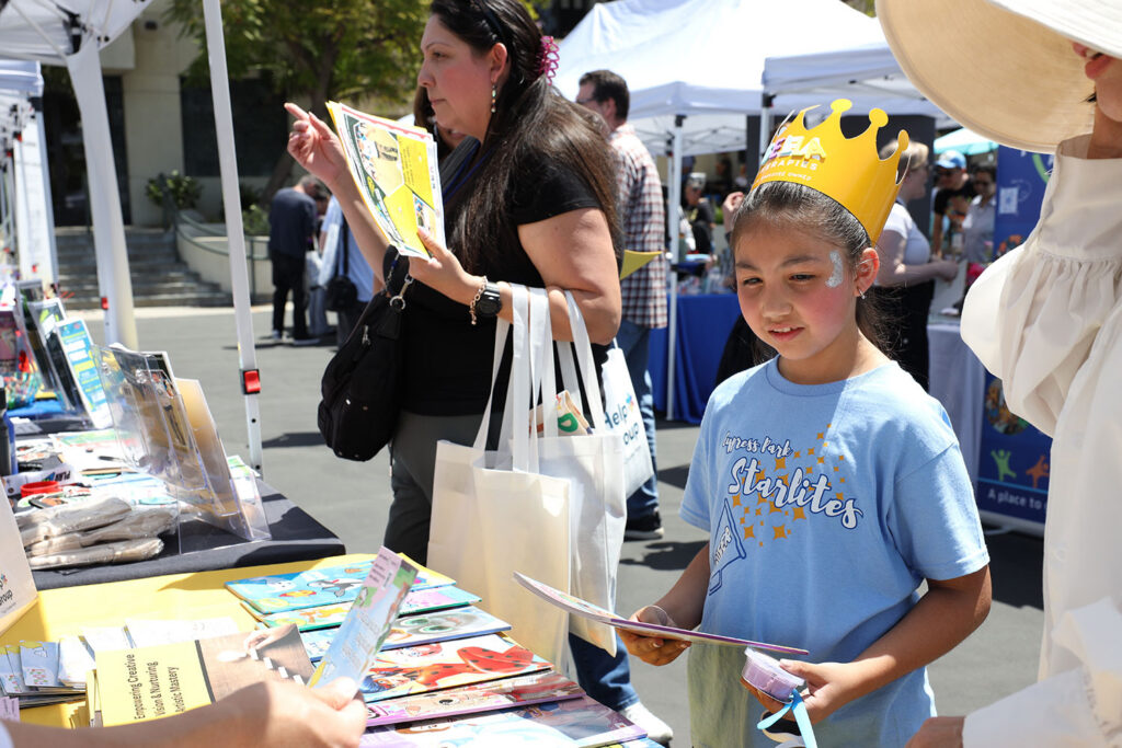 Attendees interacting with vendors at Resource Fair 2026