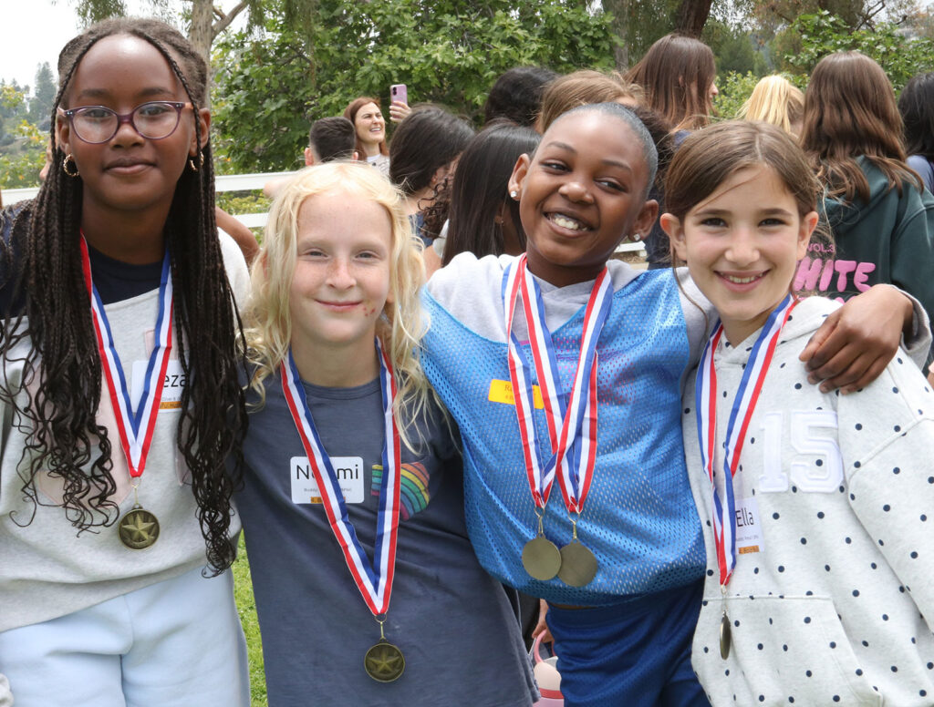 Girls with their participation medals. Students from Curtis School and Help Group Bridgeport School gathered for their second annual Unified Field Day
