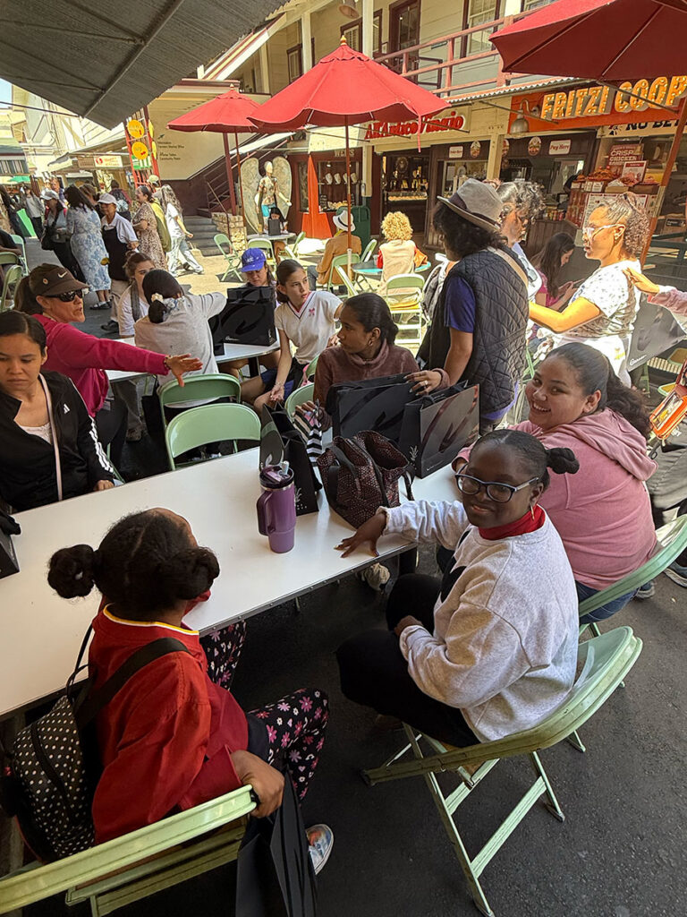 Help Group teachers and students enjoying lunch at the Grove Farmers Market Los Angeles.
